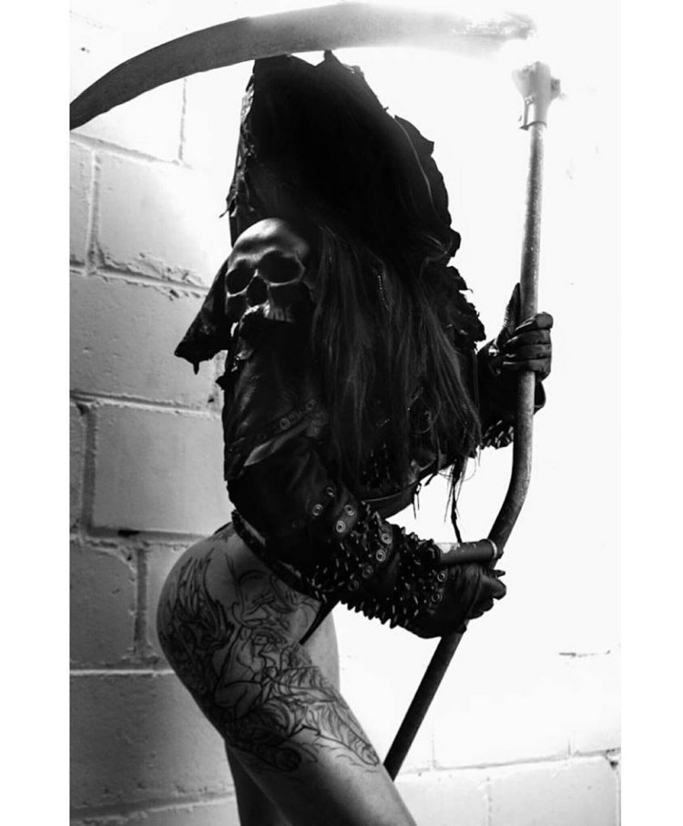 Gothic girls with a scythe