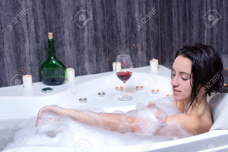 Photo shoot in a jacuzzi with foam