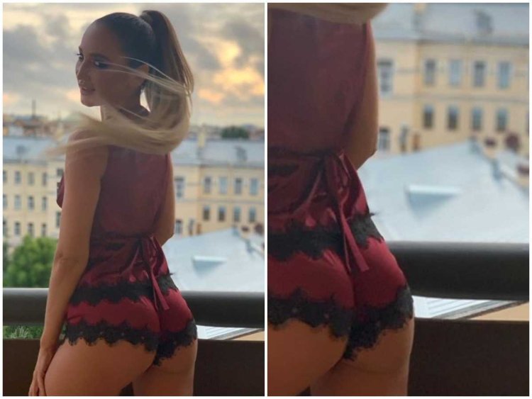 The girl lifts the dress