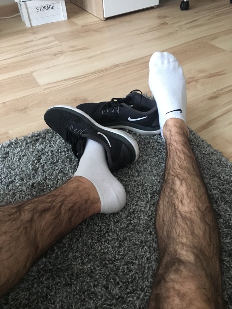 Male legs in socks foot