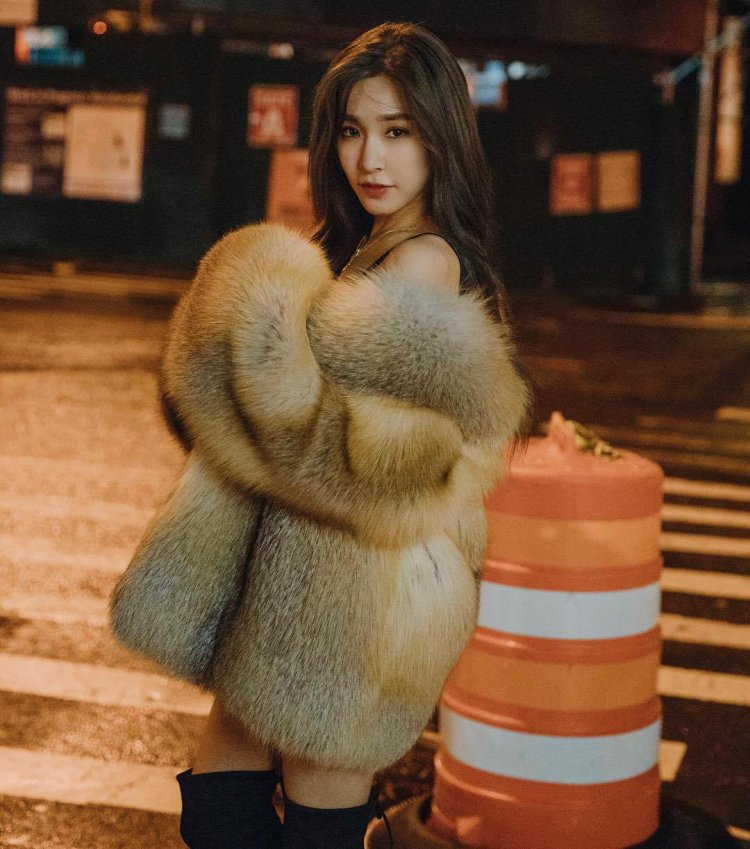 Asian girls in fur coats