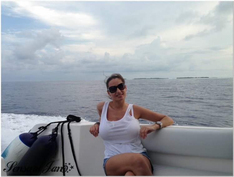 Sensual Jane on the beach sunbathing