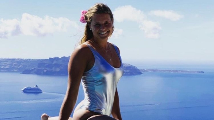 Corinn Suster in a swimsuit