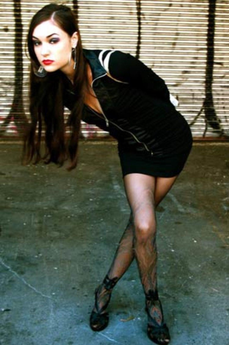 Sasha Gray in a black dress