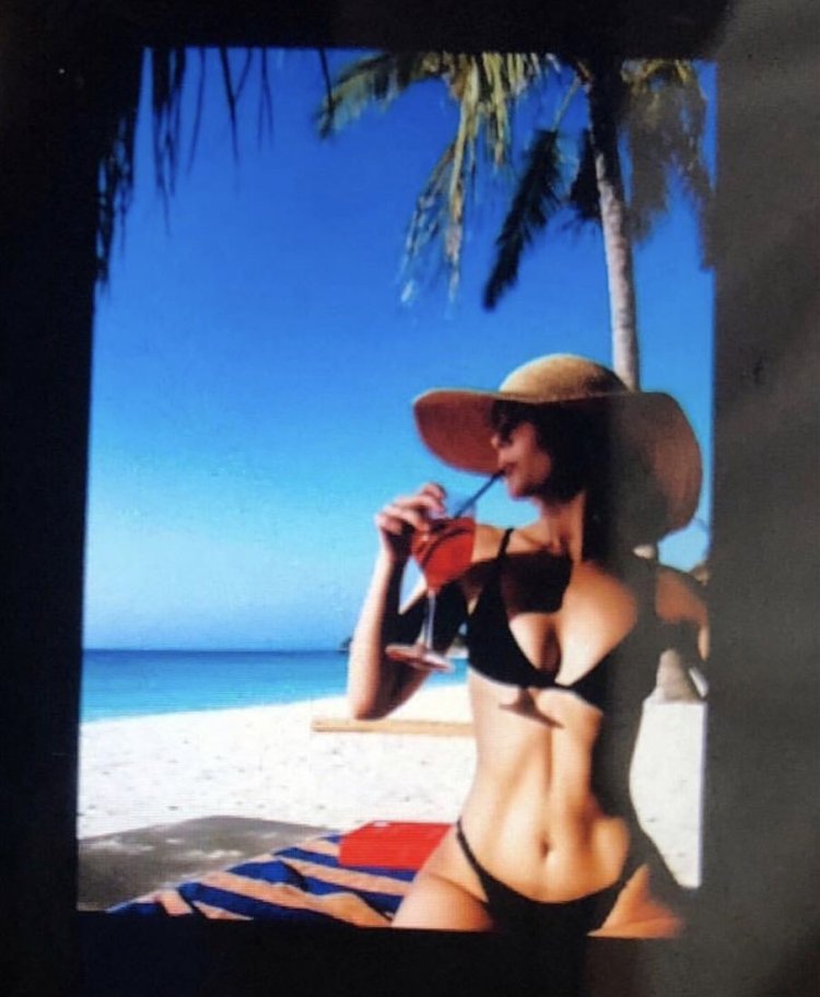 Zoe Deutsch in the paparazzi swimsuit