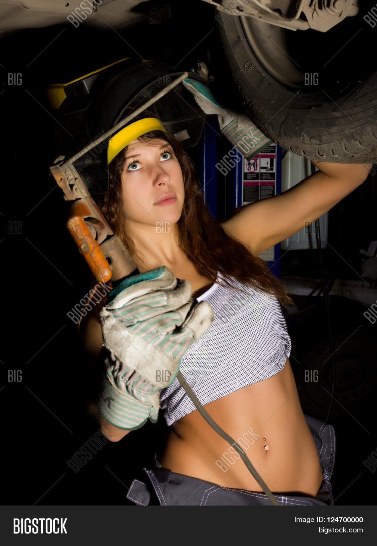 Girl in a welding mask