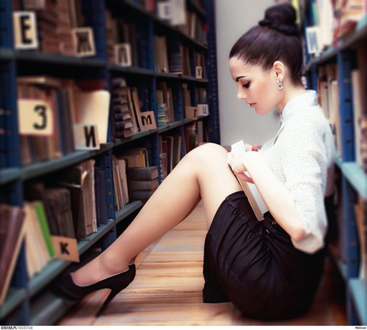 Beautiful girl with a book