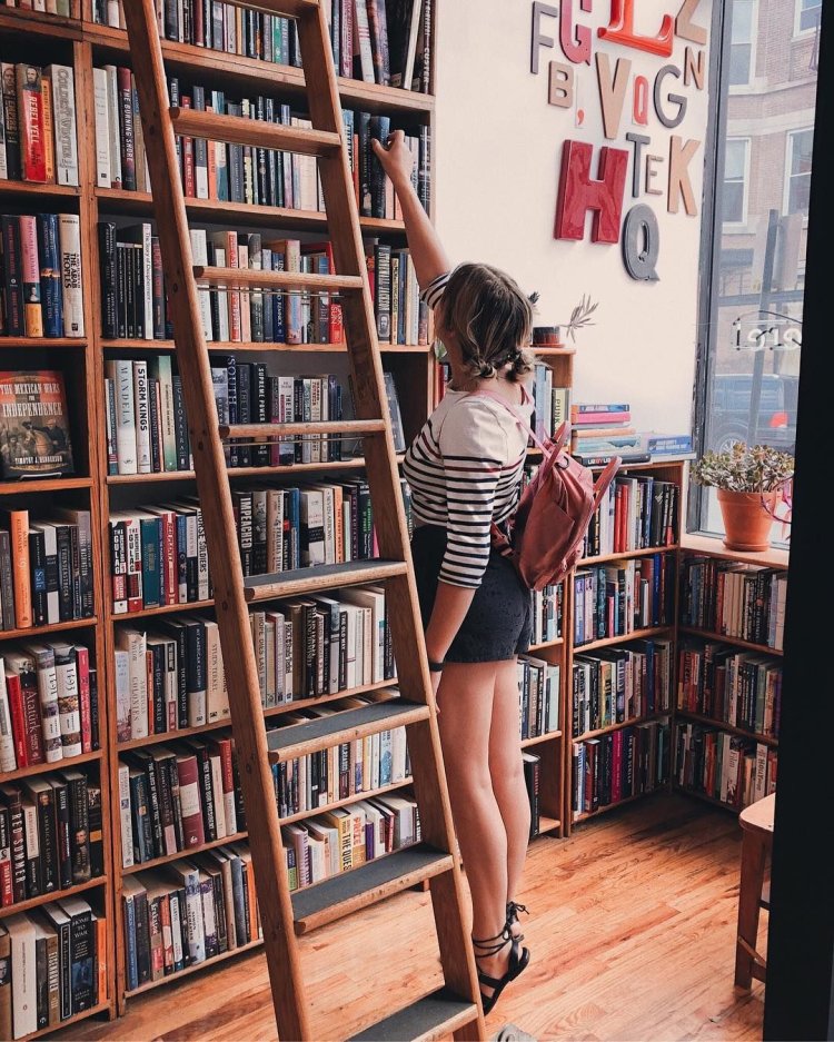 Beautiful girl in the library