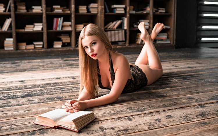 Beautiful girl with a book