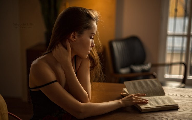 Sit at a table with good lighting