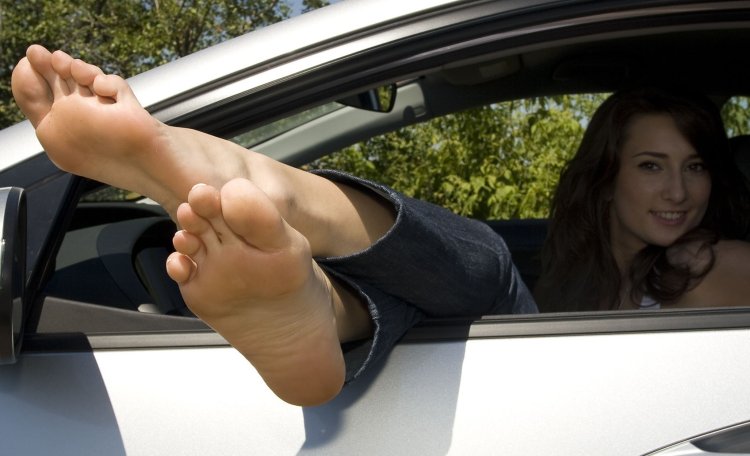 Feet in a car