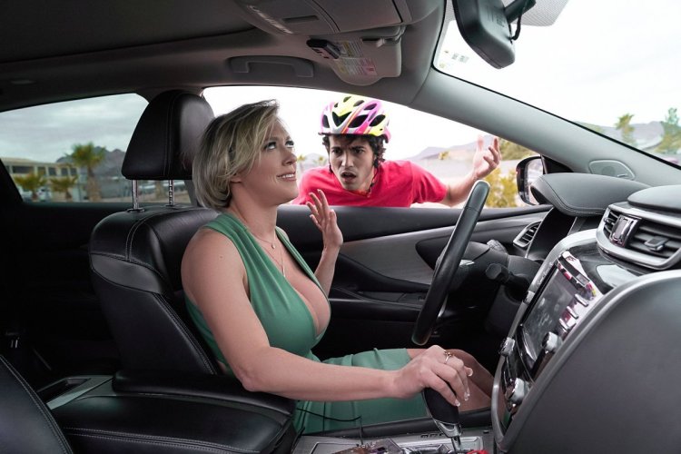 Dee Williams in a dress