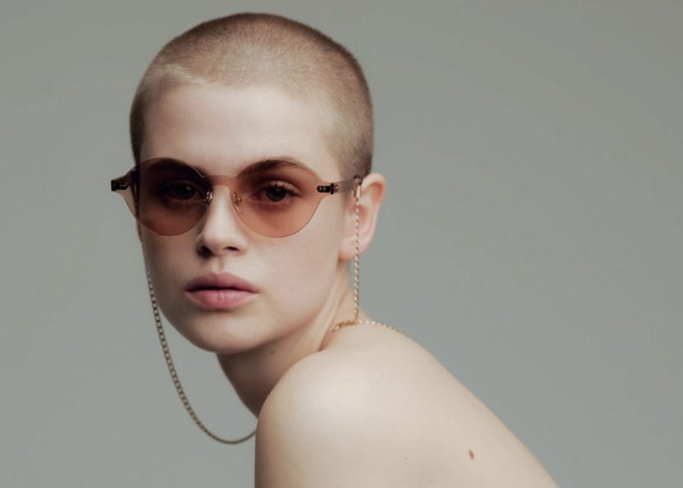 Bald girls with glasses