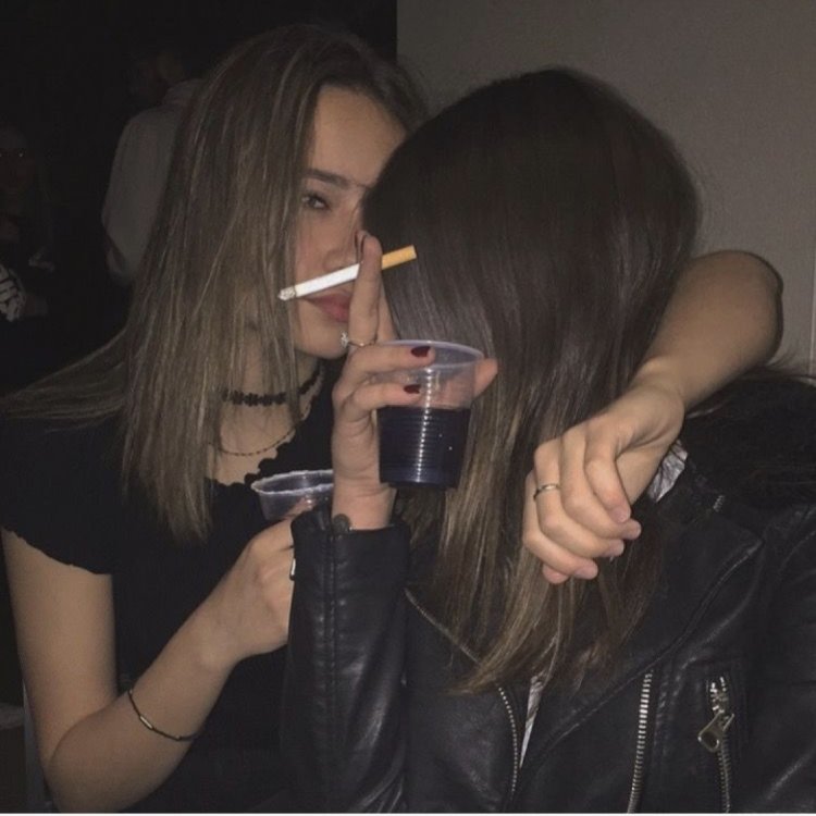 Girlfriends with cigarettes