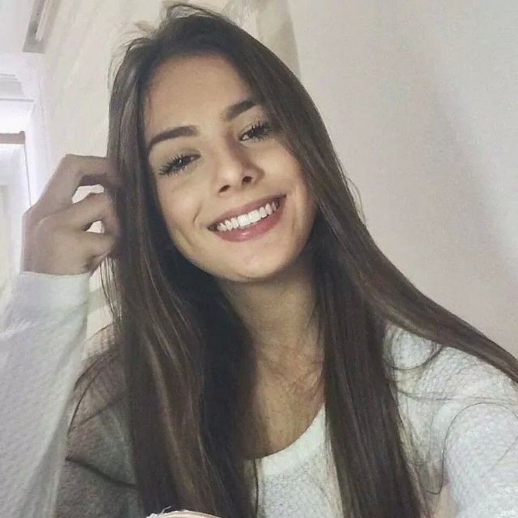 The girl smiles at Instagram