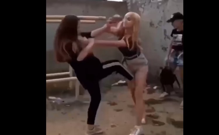 Two girls fight