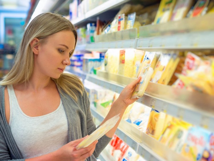 Woman at the shelf in the store