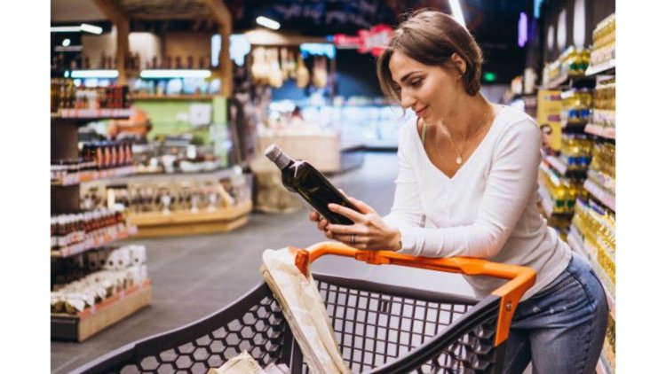 A woman buys in a store