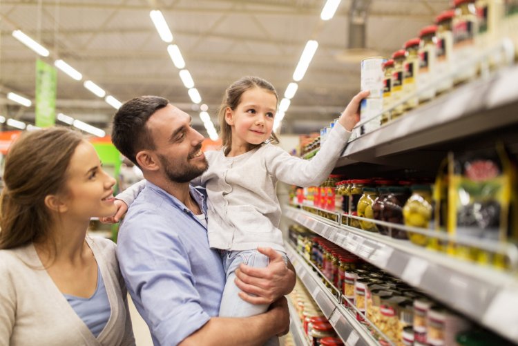 Happy buyers in a supermarket
