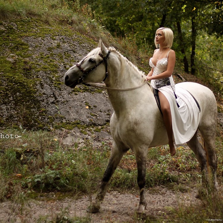 Blonde horse riding