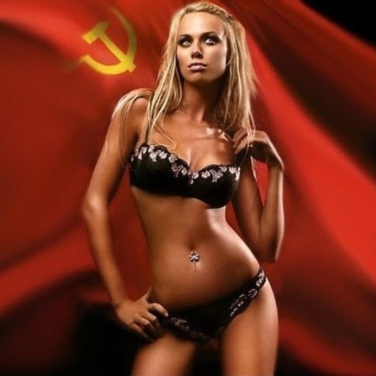 Beautiful girls against the background of the Soviet flag