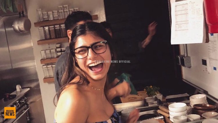 Mia Caliph Washes dishes