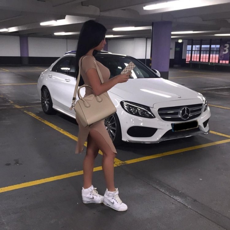 Girl near a Mercedes