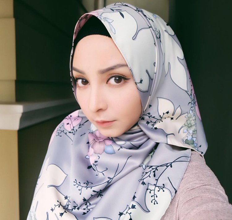 Girls in a hijab on a bus