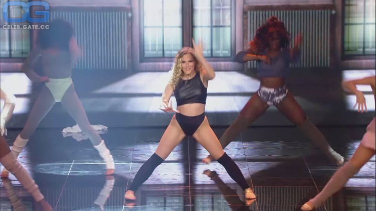 Sandy Mölling in a short stack of legs