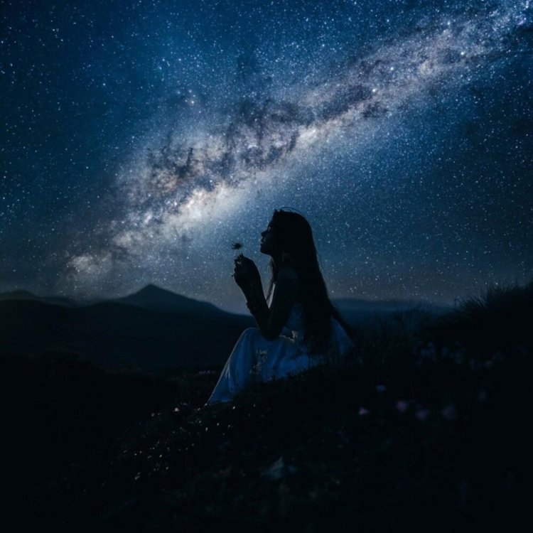 Girl looks at the stars