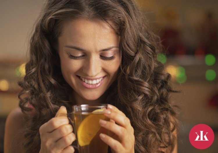 Girl cup of tea and lemon