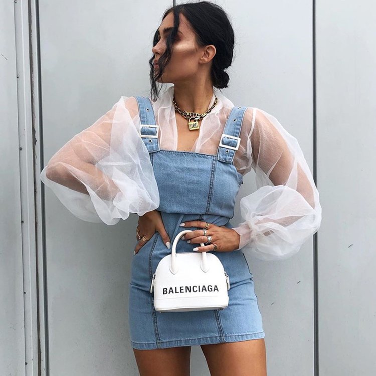 In a transparent blouse homemade