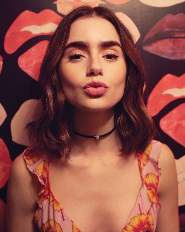 Alex Collins in a dress