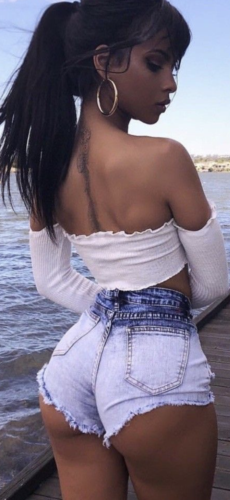 Brunette in shorts from the back