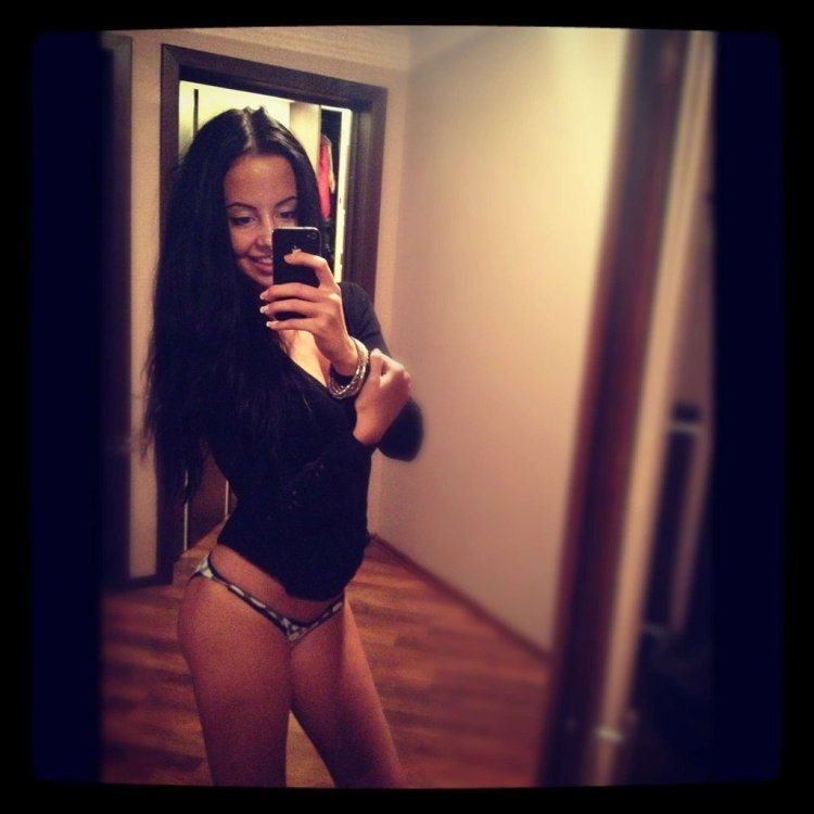 Girls take pictures in the mirror