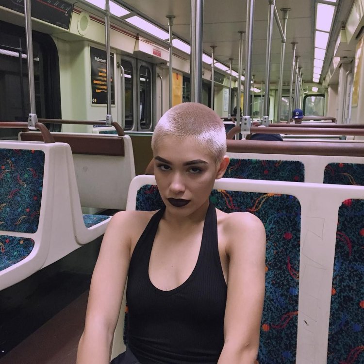 Bald girl in the subway