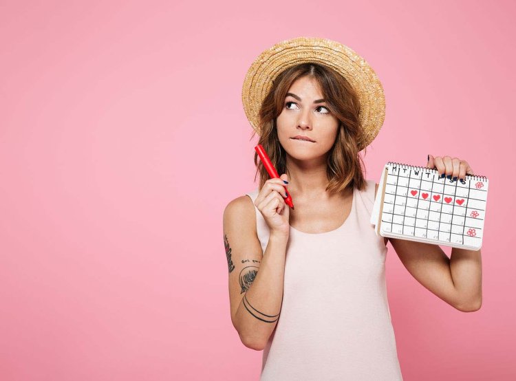 Girl with a calendar in her hands