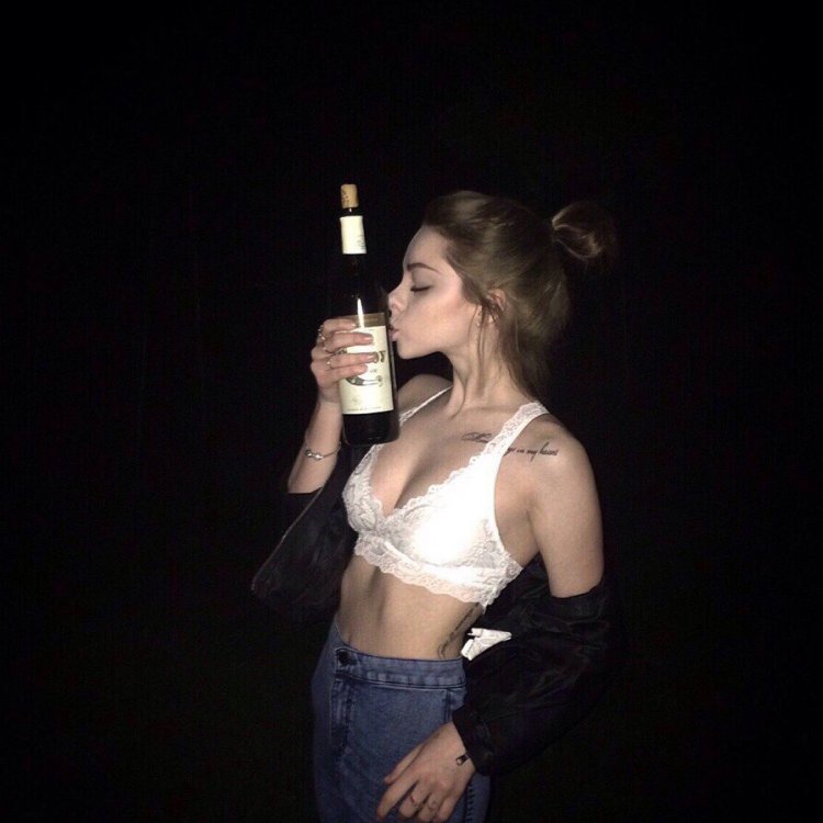 Girl with cigarette and alcohol