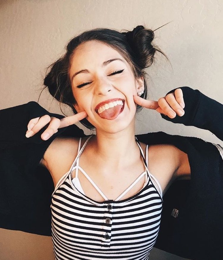 A beautiful girl is fooling around