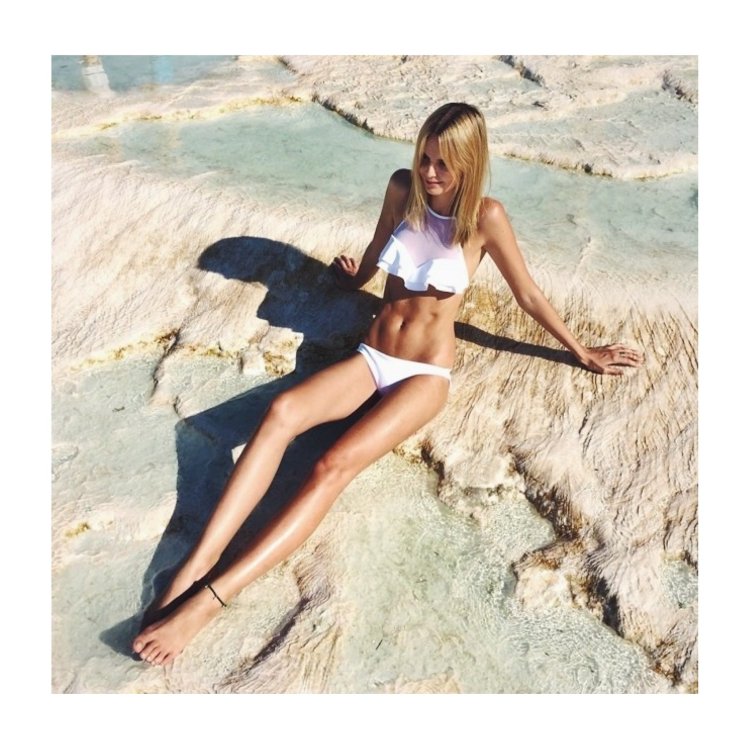 Sasha Luss in a swimsuit on the beach