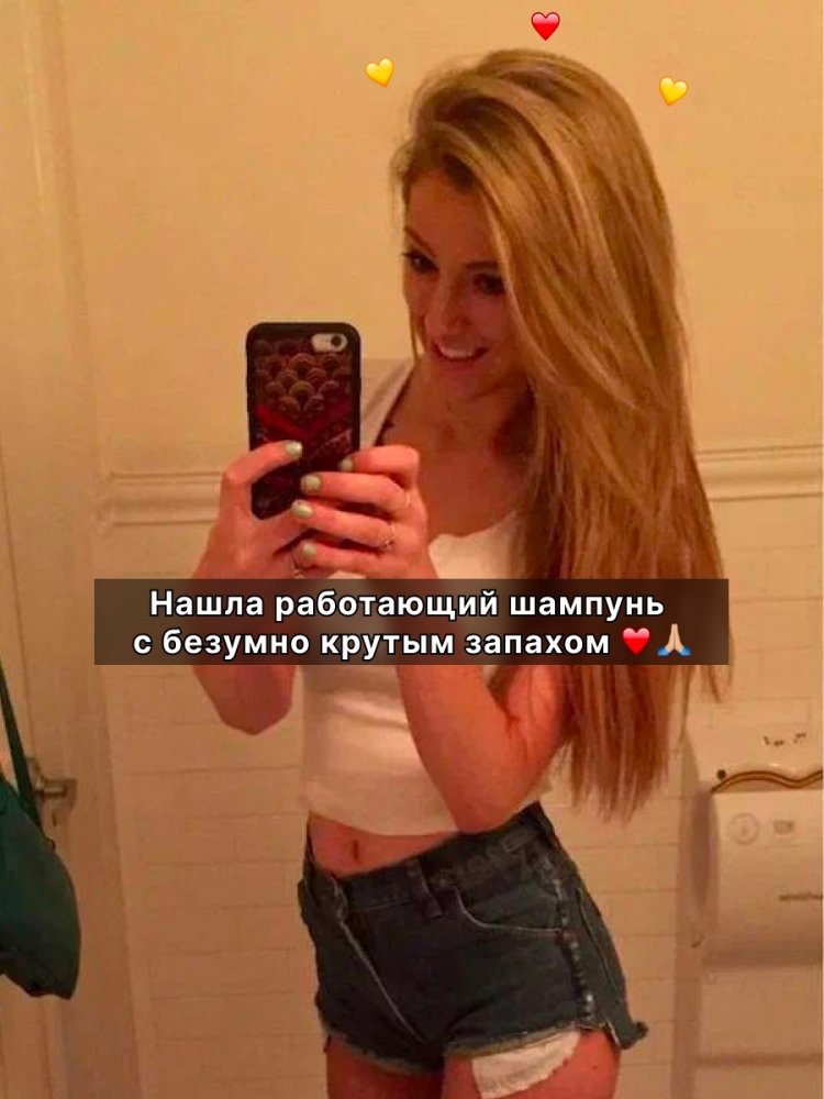 Blonde in front of the mirror