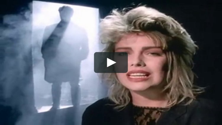 Kim Wilde smokes