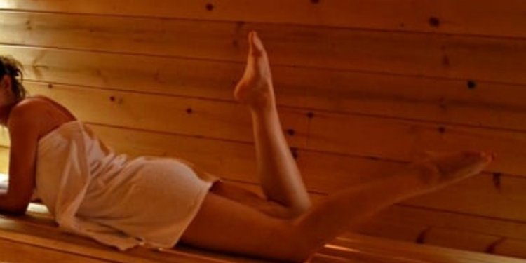 Girl in a sauna without a face
