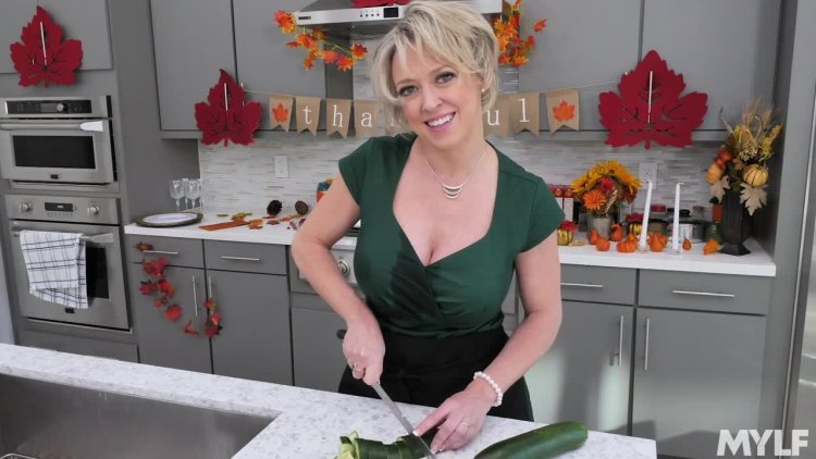 Dee Williams in the kitchen with chicken