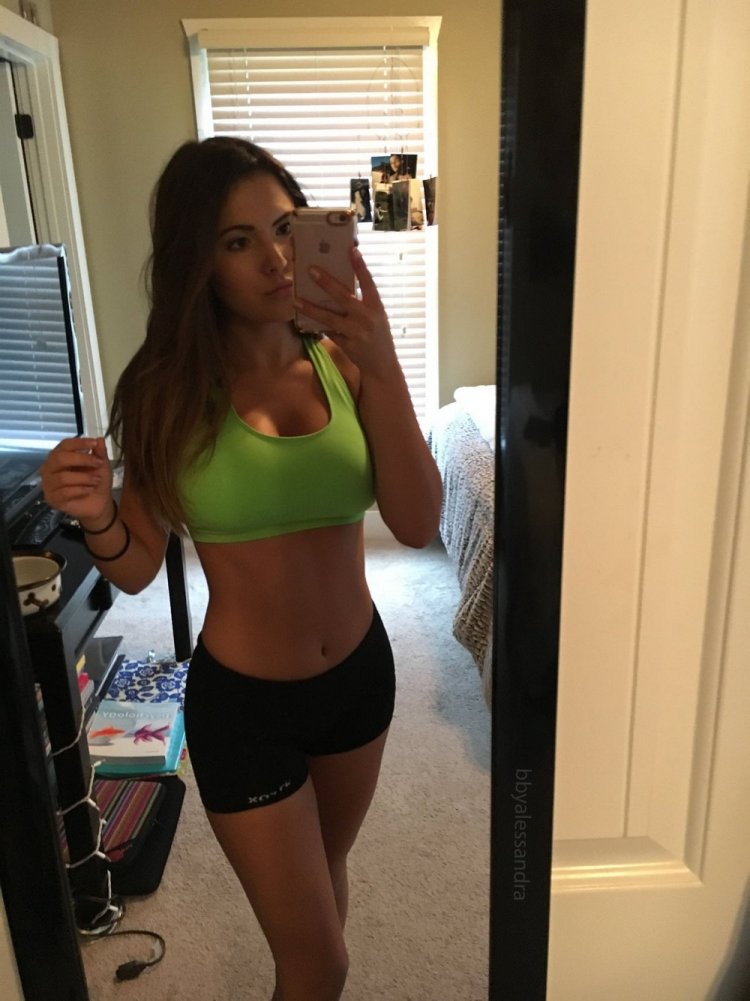 The girl takes pictures of herself