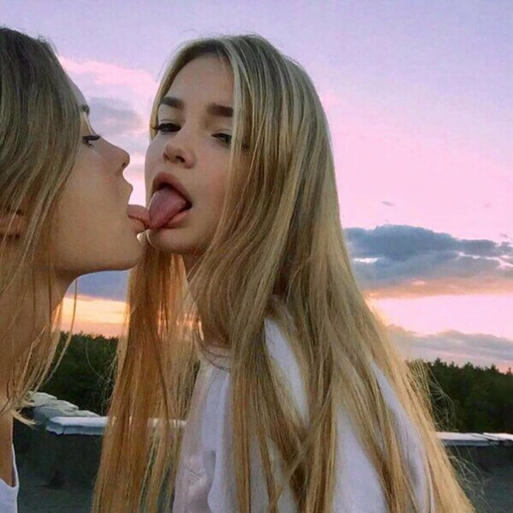 Young girlfriends with tongues