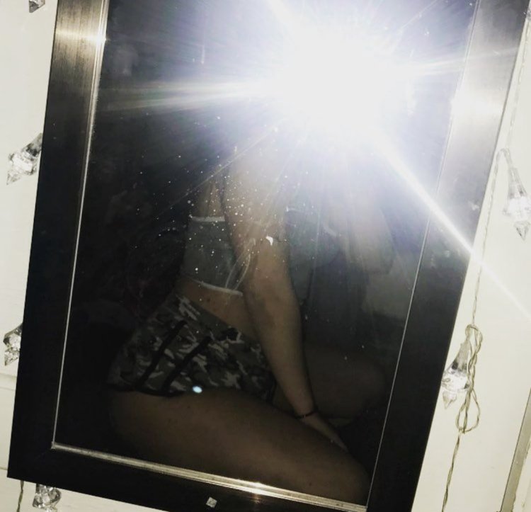 Girls in the mirror with a flash