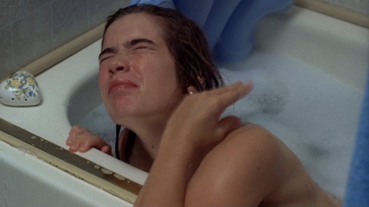 Heather Langenkamp in the bathroom