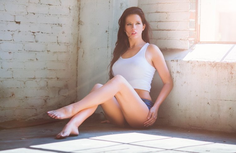 Barefoot girl in shorts