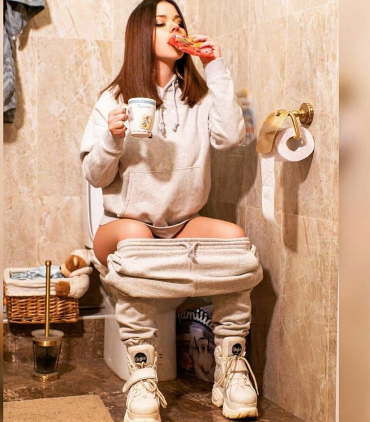 Girl on the toilet